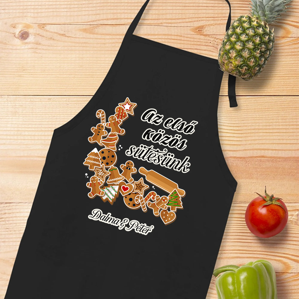 Az első közös karácsony szerkeszthető dátummal és névvel páros fekete kötény