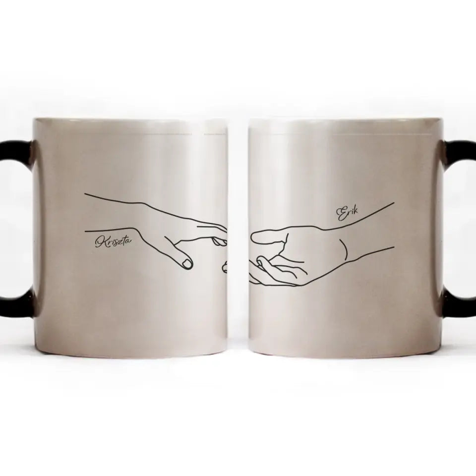 Neves bögre egymás felé nyúló kezekkel