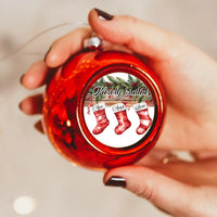 Karácsonyi piros gömbdísz piros csizmácskákkal