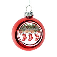 Karácsonyi piros gömbdísz piros csizmácskákkal
