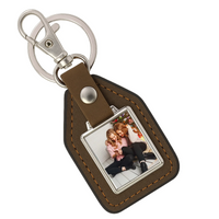 Ajándék testvérnek karácsonyra egyedi képes kulcstartó bőrháttérrel