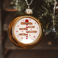 Útmutató karácsonyi arany gömbdísz az egész család nevével