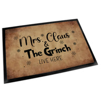 Mrs. Claus & The Grinch lábtörlő