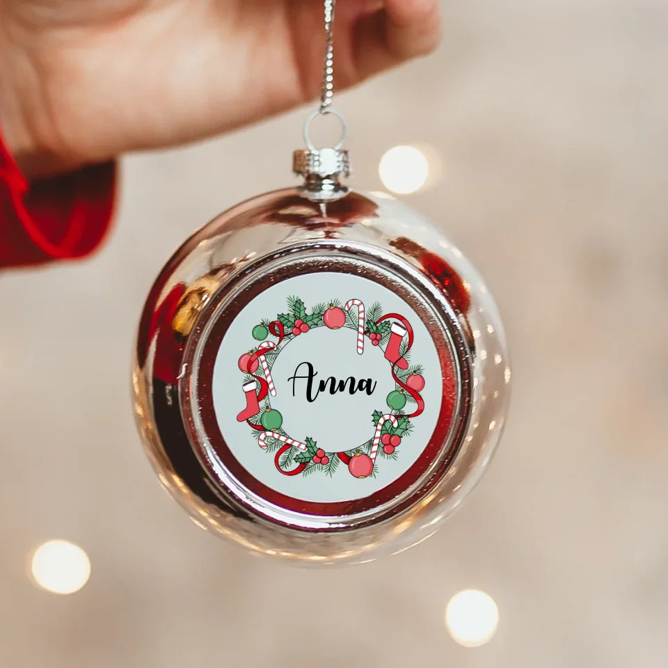 Ezüst gömbdísz névvel