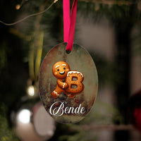 Karácsonyi mintás ovális dísz egyedi névvel és kezdőbetűvel